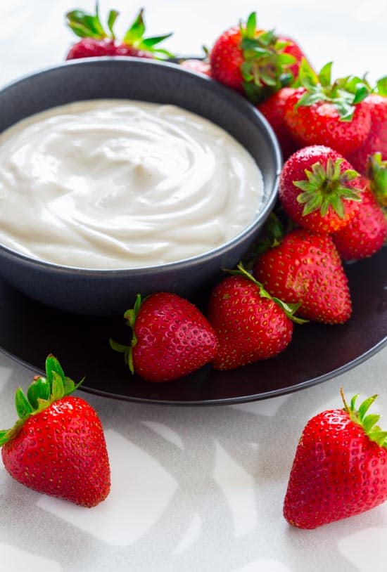 Maple Greek Yogurt Dip in a bowl with berries