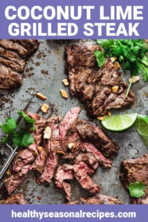 Skirt steak with cilantro and lime on a baking sheet