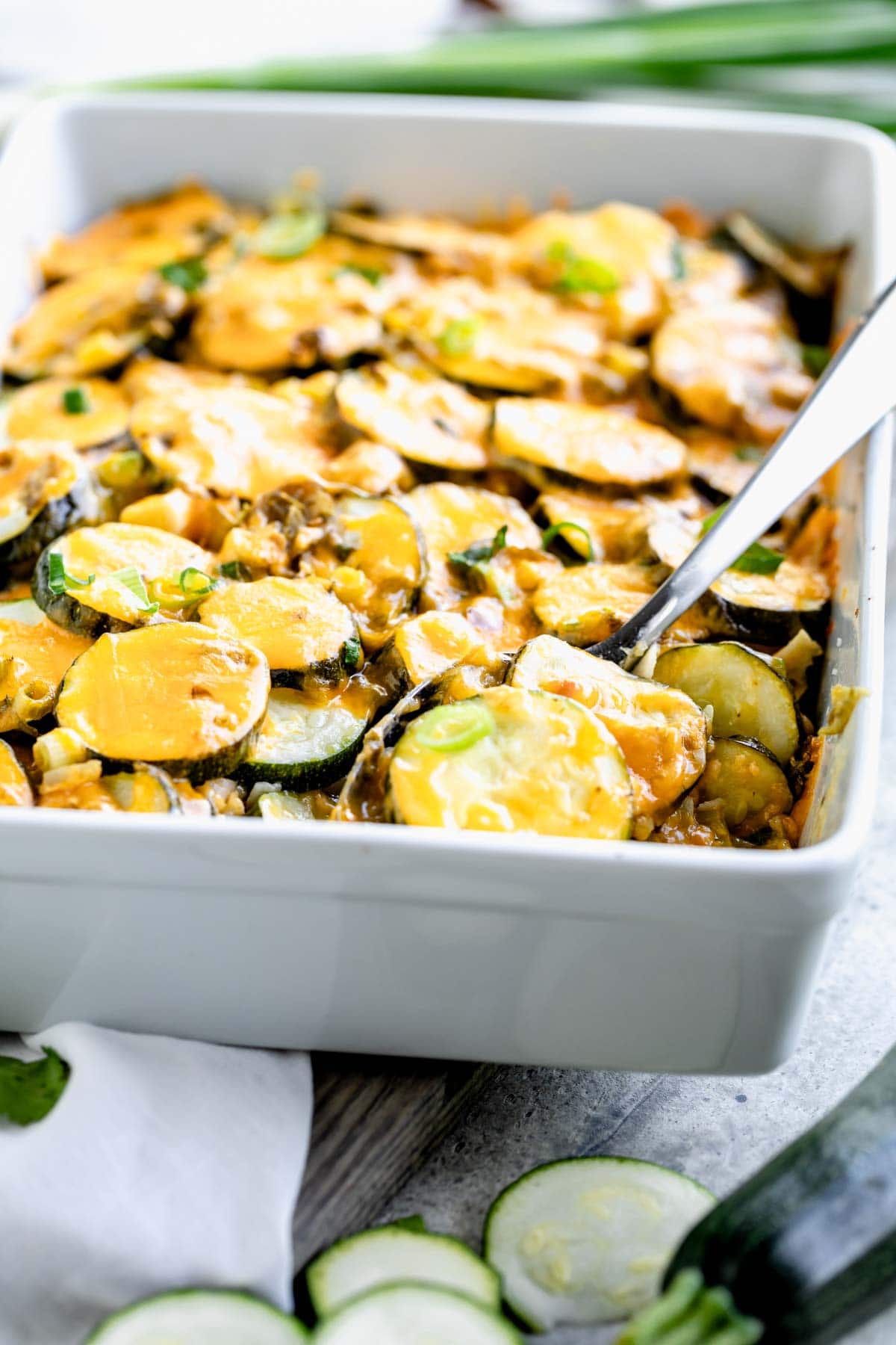 side angle of the casserole with a spoon scooping into it
