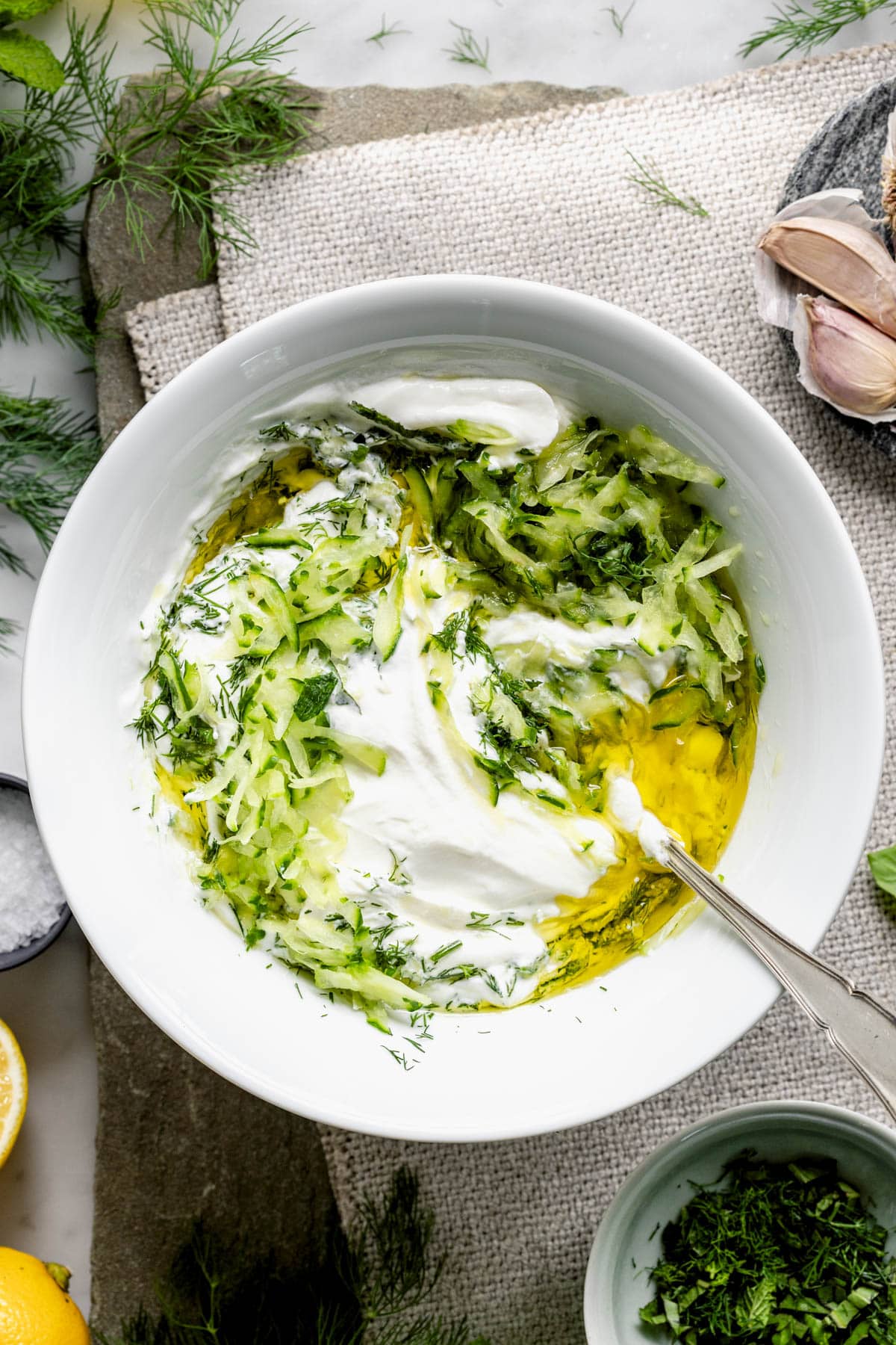 the Tzatziki right before it is completely stirred together