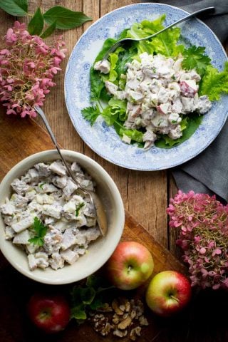 Healthy Waldorf Chicken Salad, an easy gluten-free lunch that is high in protein but under 300 calories! It has celery, apples, walnuts and poached chicken breast in a creamy Greek yogurt dressing. #healthy #glutenfree #lunch #highprotein #chicken #chickensalad #apples #celery #walnuts #cleaneating #GreekYogurt #healthyseasonal