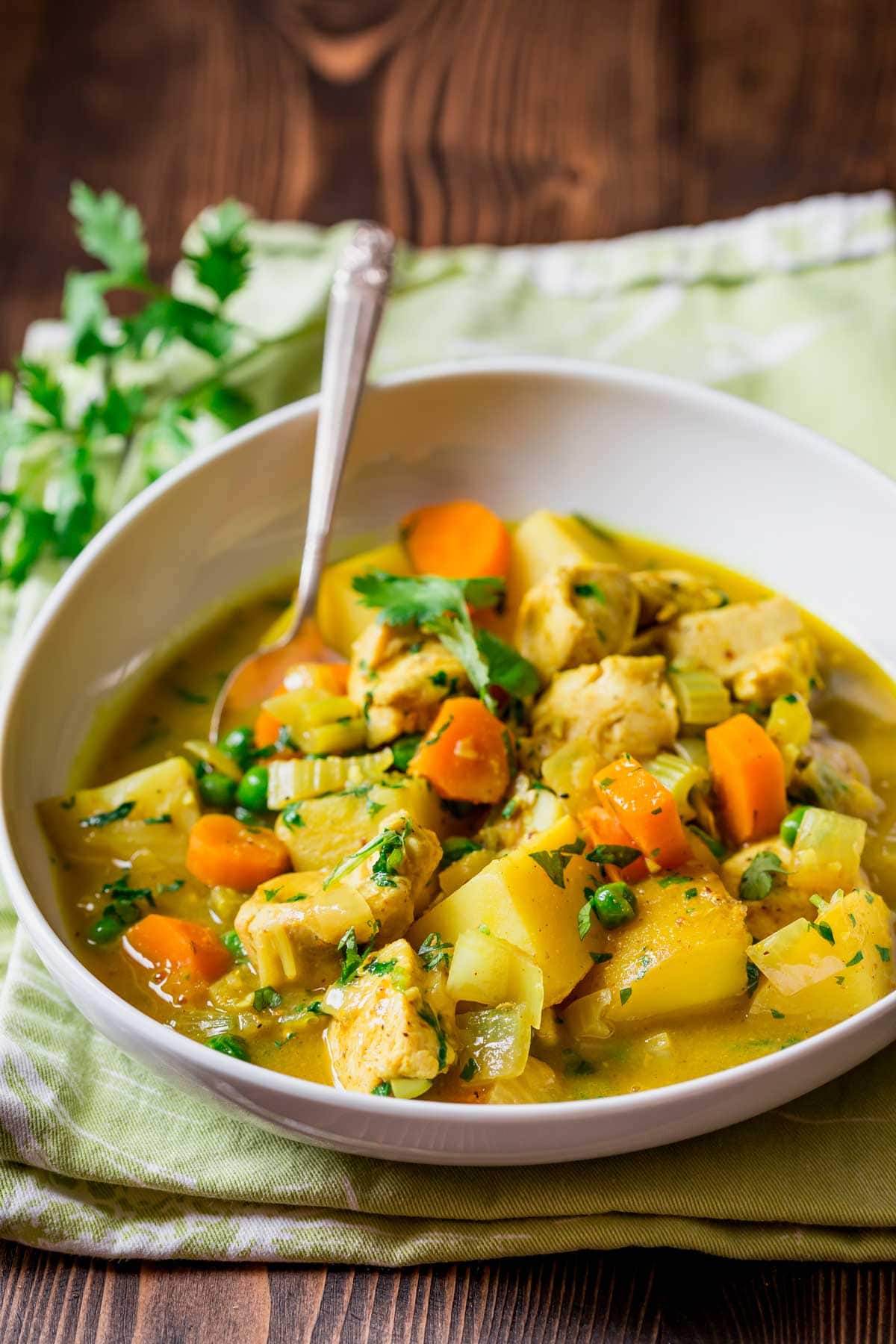 a serving of the curry with a spoon in it