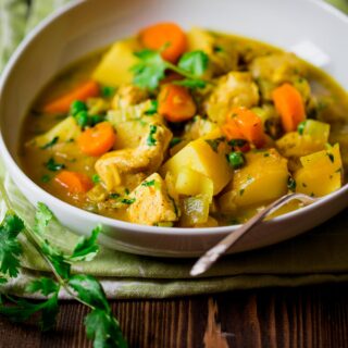 close-up of the curry in a white bowl from the side