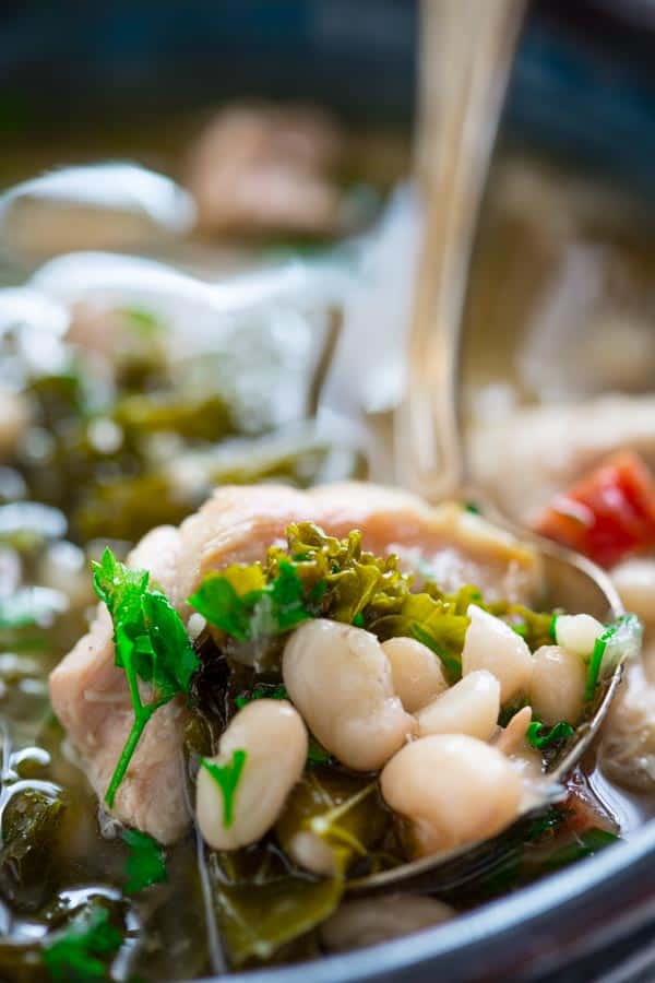 A close up of the Slow Cooker White Bean Stew in a serving bowl