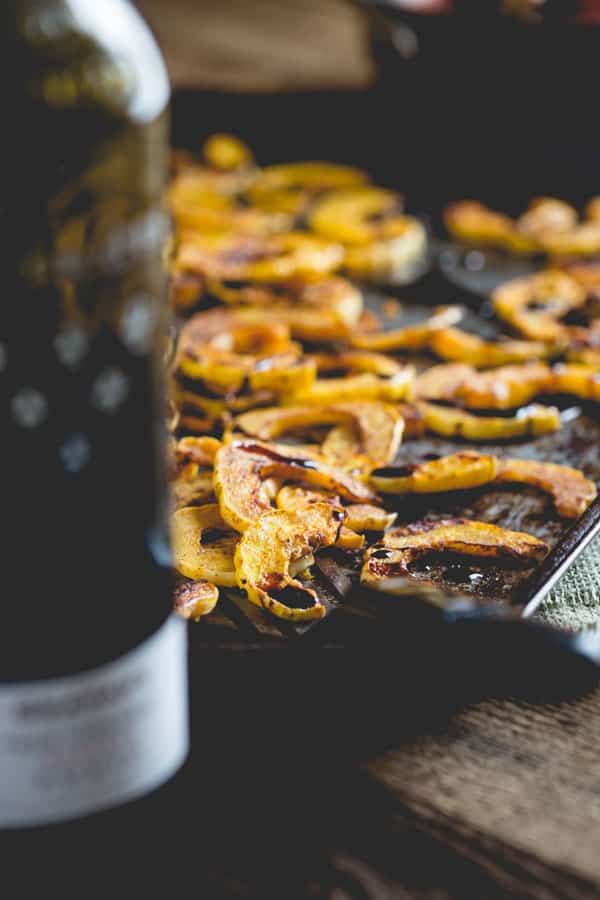 Spice Roasted Delicata Squash with Port Wine Sauce drizzled over top