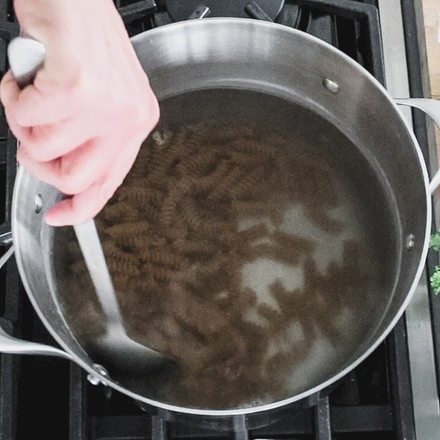 whole wheat pasta in a pot of water