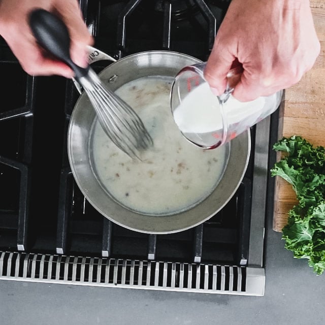Add milk and whisk