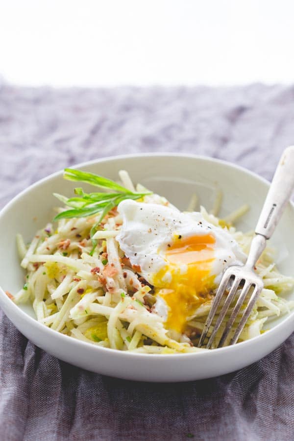 Kohlrabi Bistro Salad with poached egg in a bowl