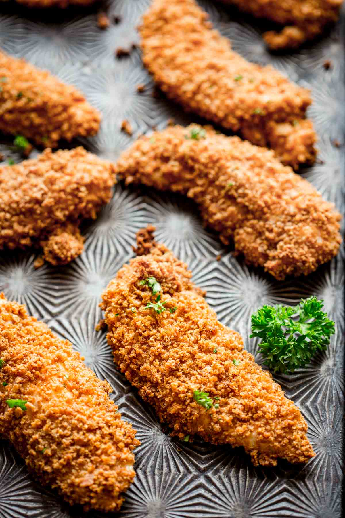 chicken tenderson on a sheet pan once they have been baked