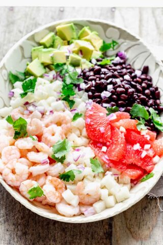 overhead of the mexican jicama shrimp salad with black beans