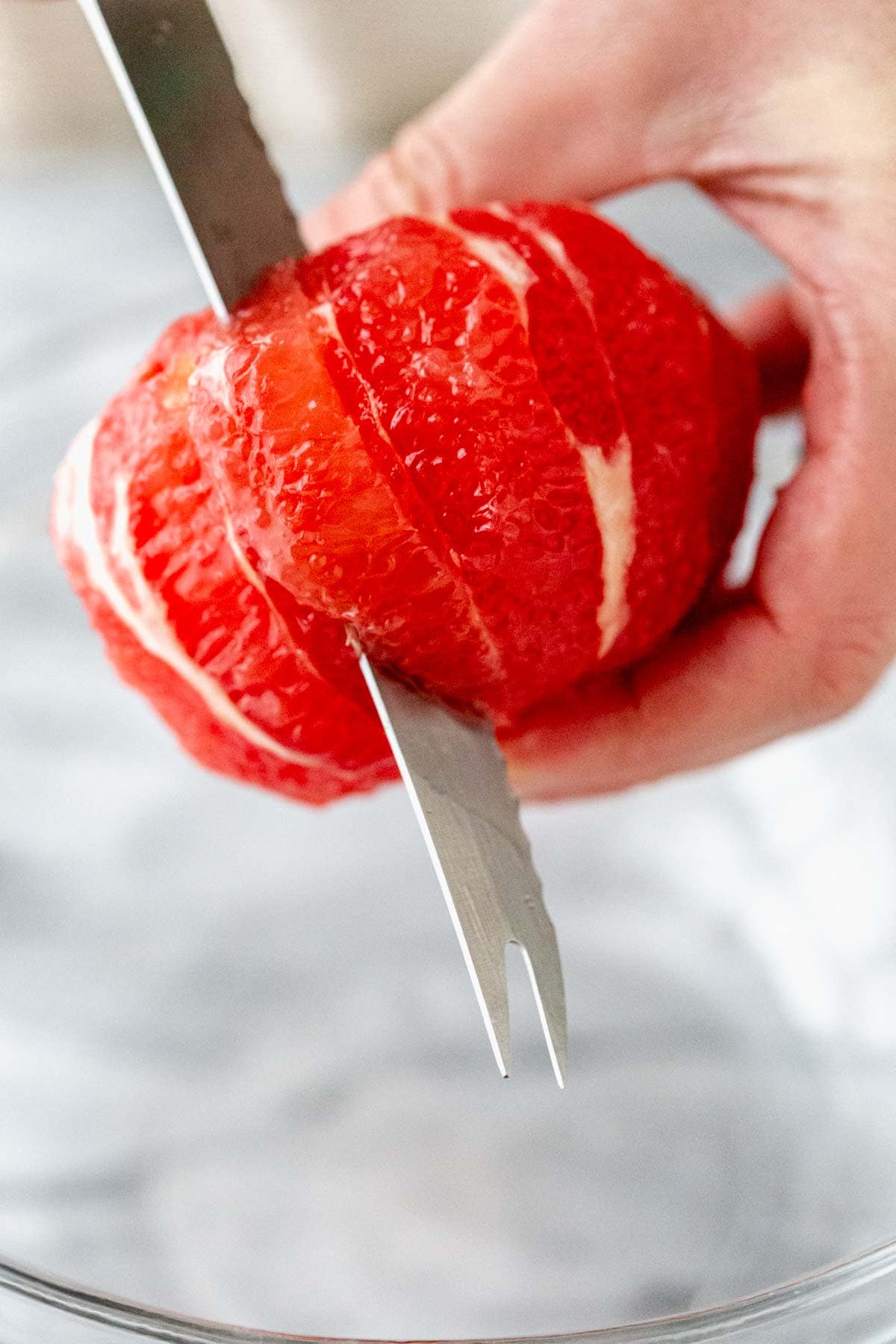 cutting the grapefruit for the salad