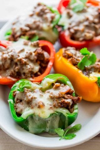 low carb mexican stuffed peppers on a white platter