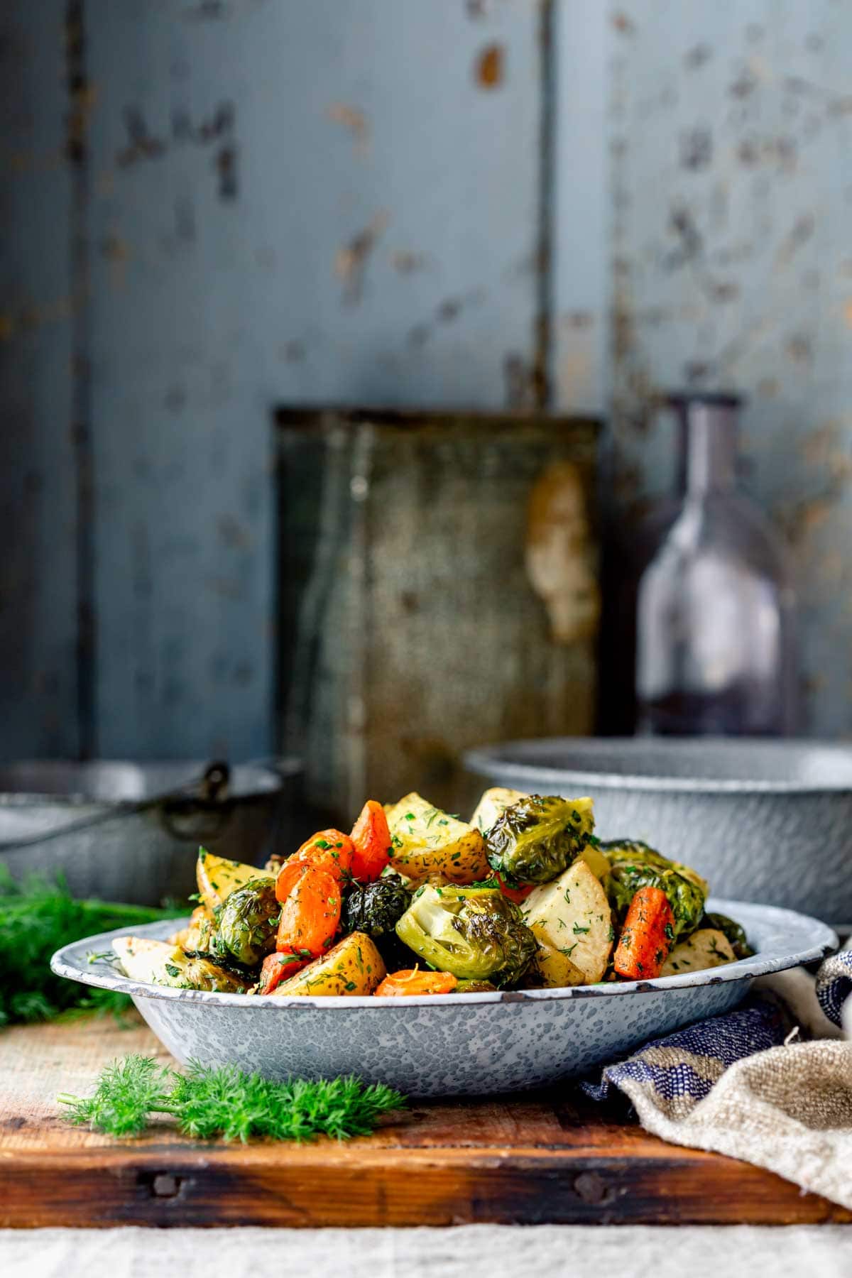 metal pan with roasted veggies in it