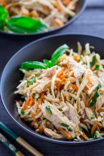 black bowl with the shredded celery root salad with chicken and carrots