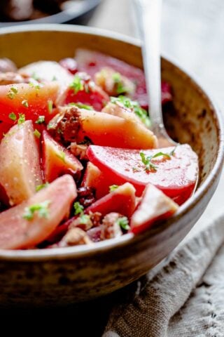 close-up of the cooked and cut beets from the side with light reflecting off them