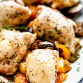 close-up of chicken and squash sheet pan dinner on a platter