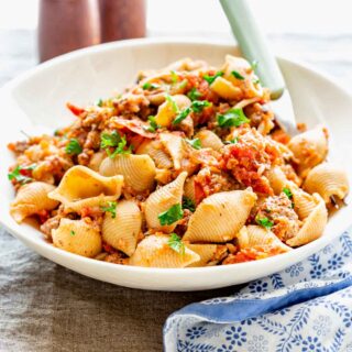 bolognese in a white bowl