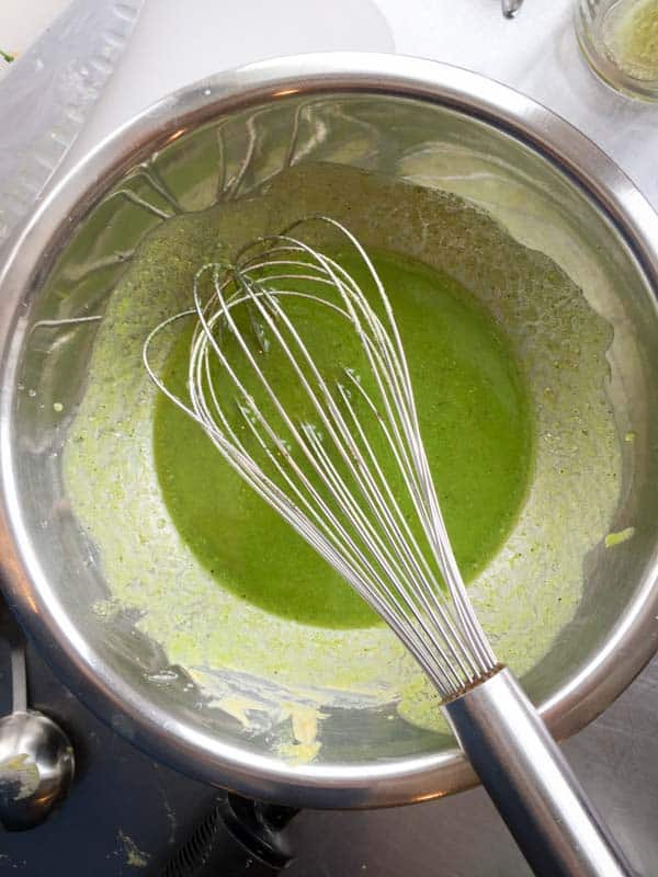 whisking chive oil salad dressing