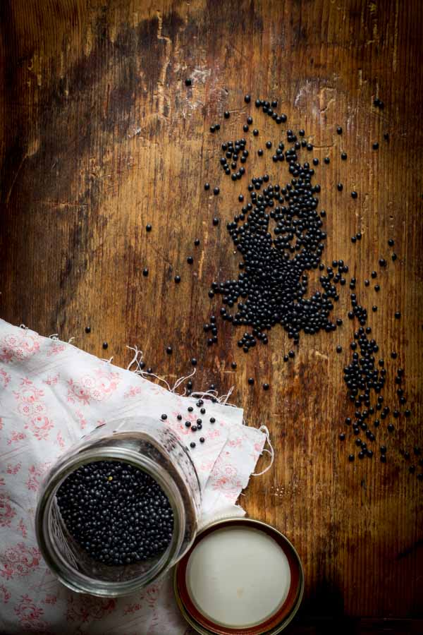 black lentils on a countertop