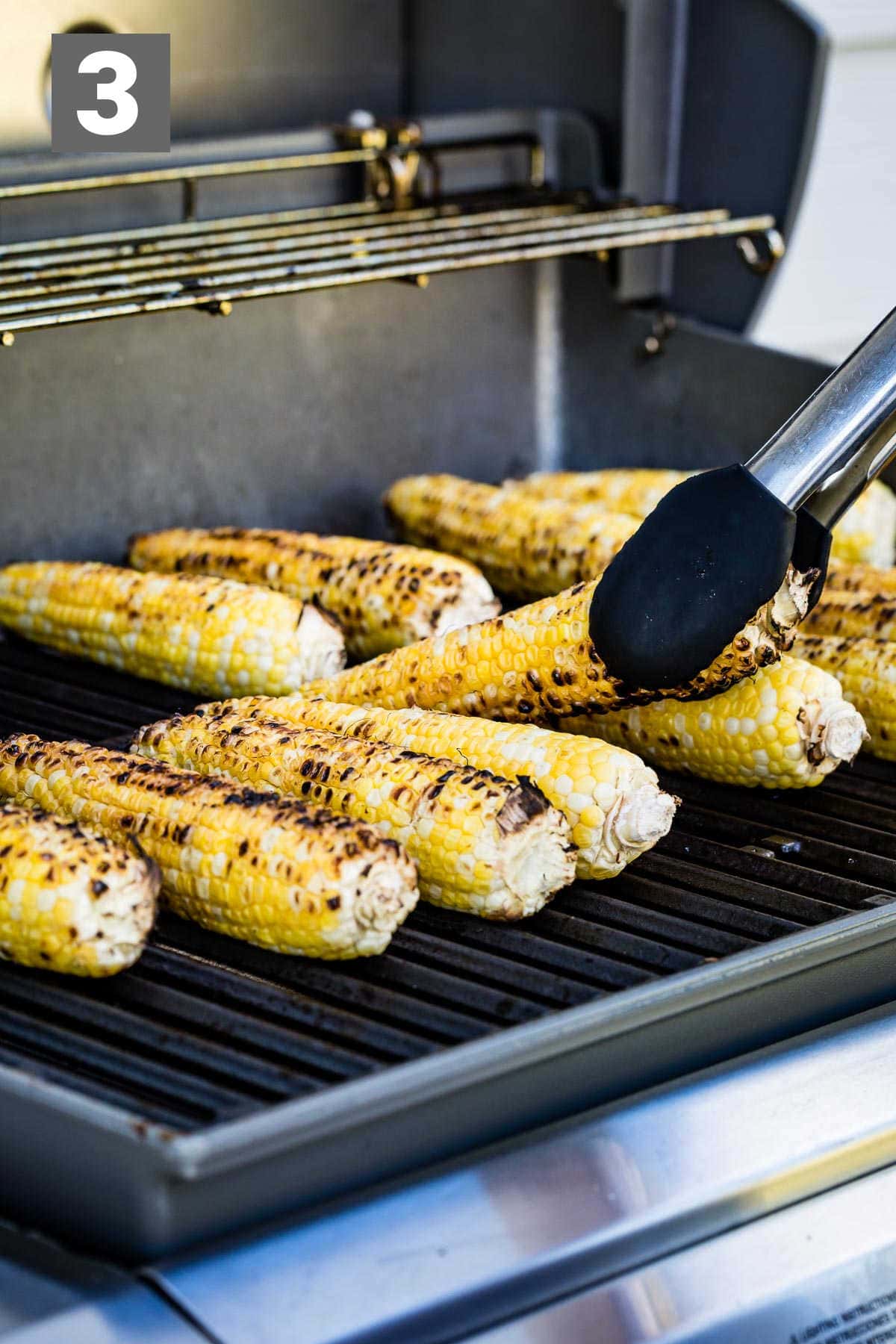 grill the corn until it is charred lightly on all sides