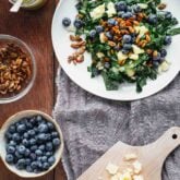 a plate of salad with the mise en place around it