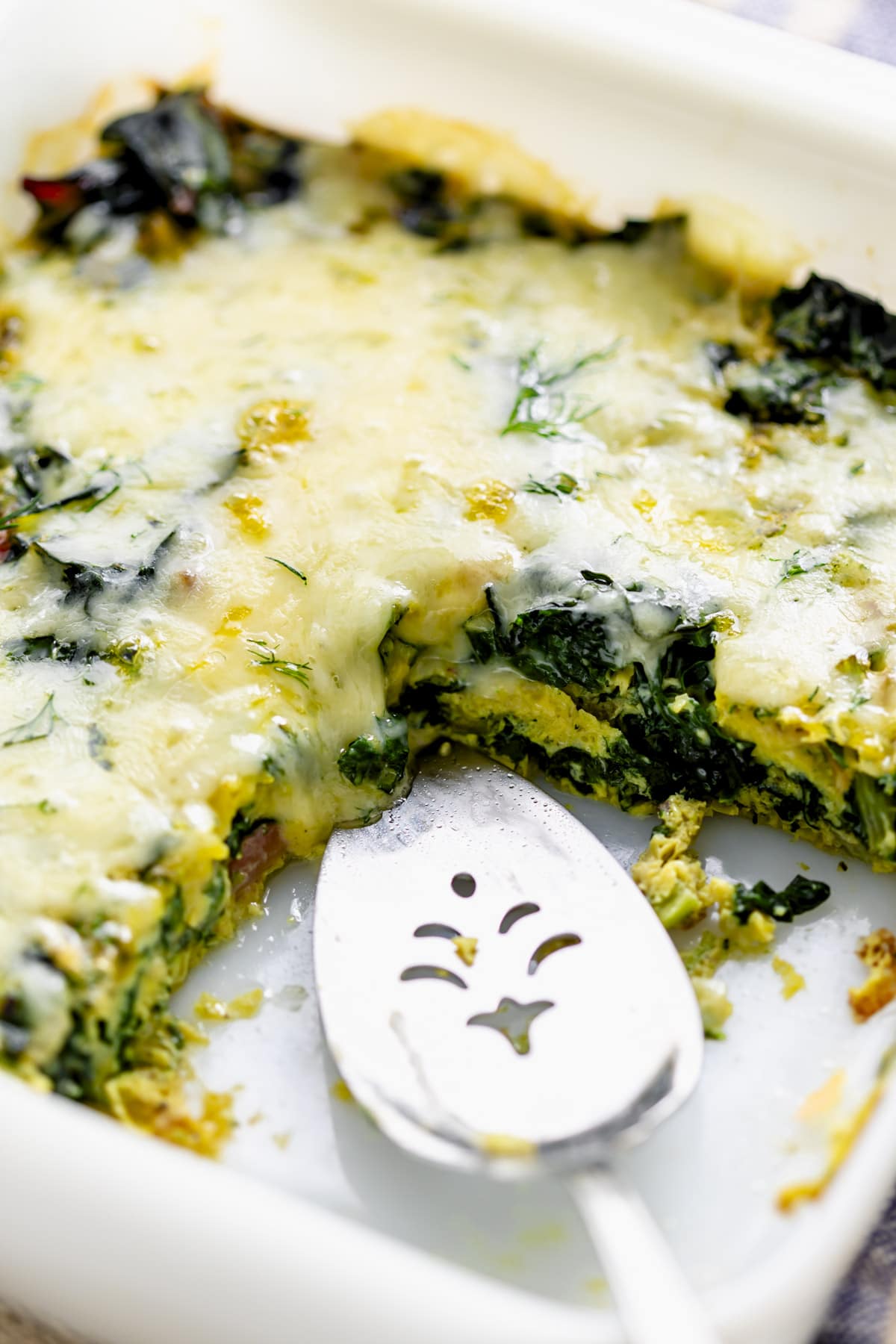 the chard egg bake with a slice removed