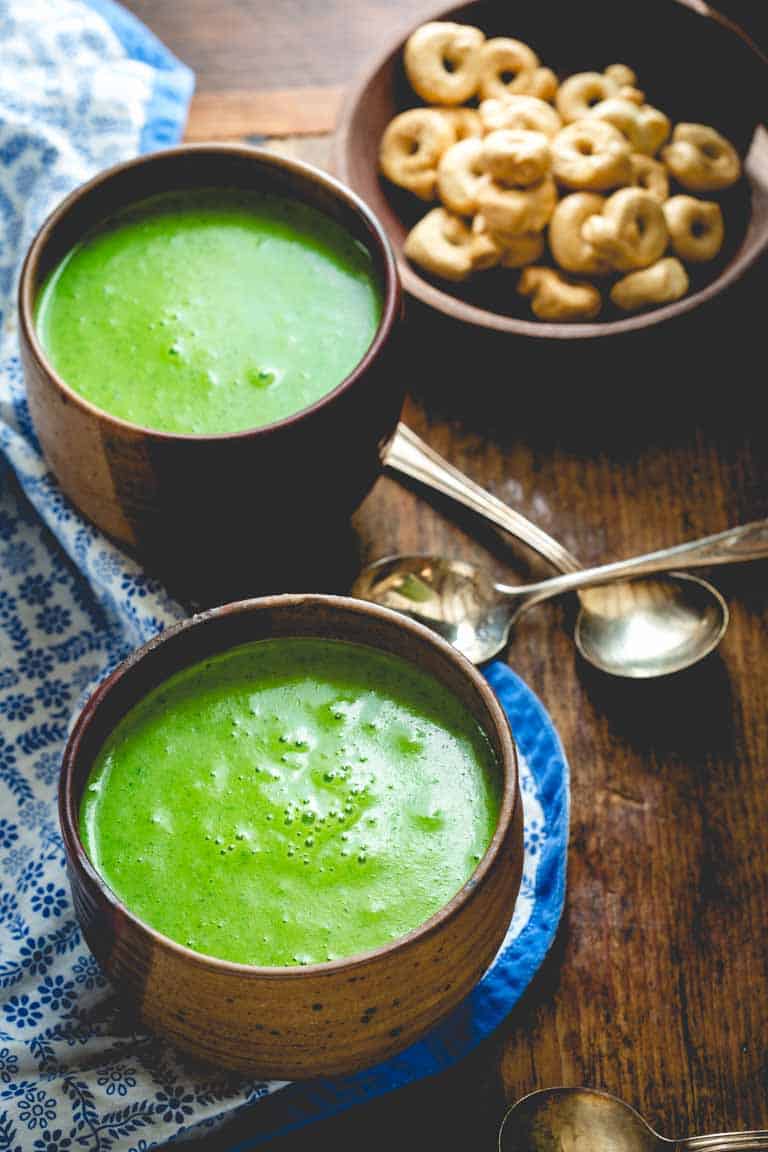 two bowls of 4 ingredient soup made with kale, potatoes, and cheddar