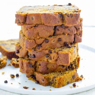 a stack of Healthy Chocolate Chip Pumpkin Bread on a white plate
