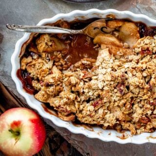 closeup of the apple crisp in a white ceramic dish