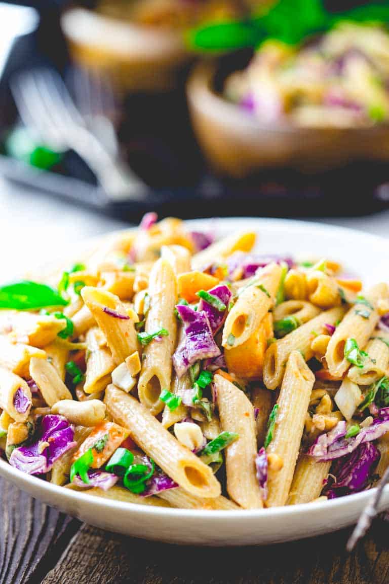 Peanut Noodles with Cabbage and Basil in a bowl