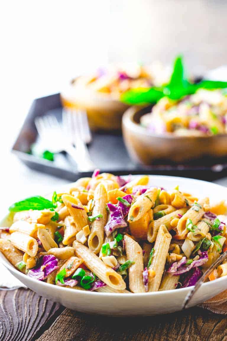 Peanut Noodles with Cabbage and Basil in a serving bowl