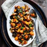roasted squash dinner on an oval platter