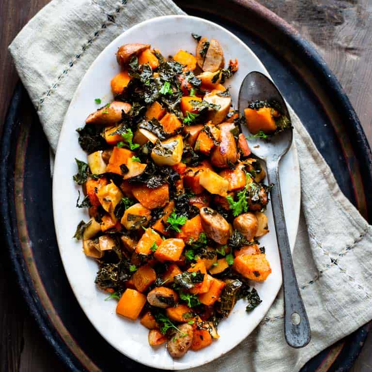 roasted squash dinner on an oval platter
