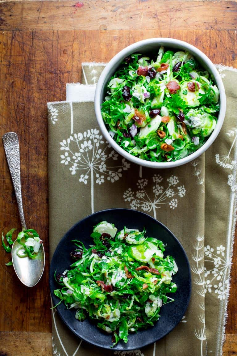 Brussels Sprouts Slaw with Bacon in a serving bowl
