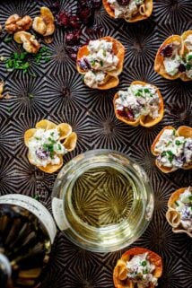 overhead of the chicken salad bites on a black sheet pan