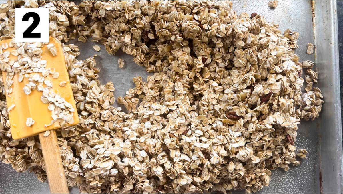 spreading the raw granola onto the pan