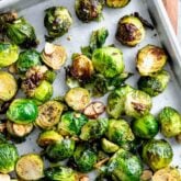 sheet pan with roasted balsamic brussels sprouts on it