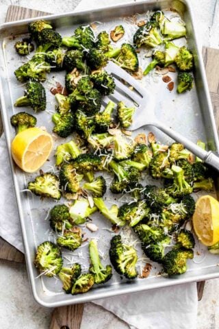 overhead view of roasted broccoli on sheet pan