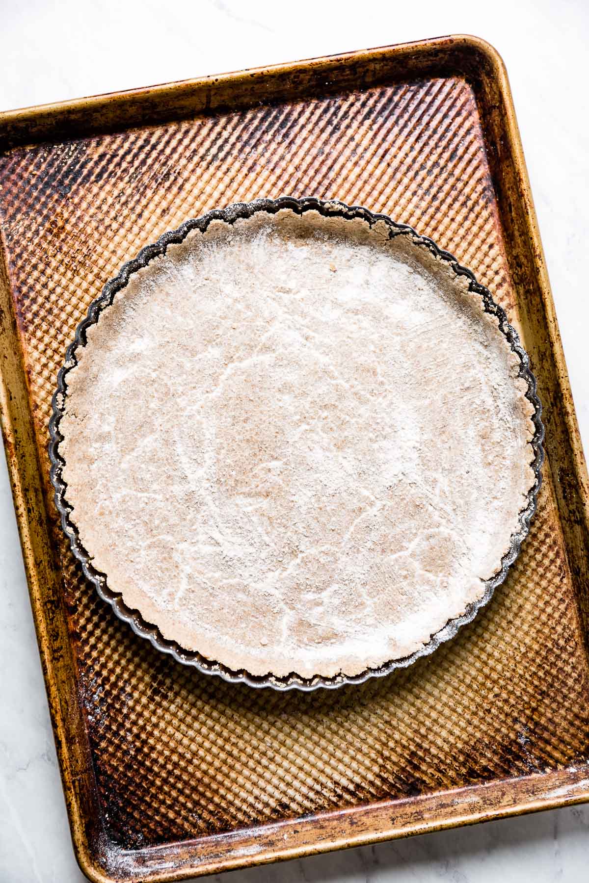 the crust after the flour is brushed on it