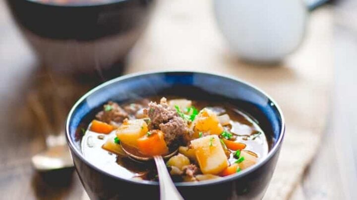 Two bowls of Beef Stew on a table.