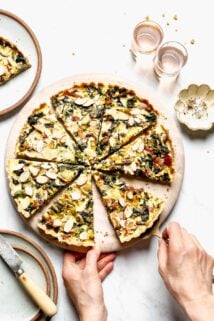tart cut into wedges on a round board