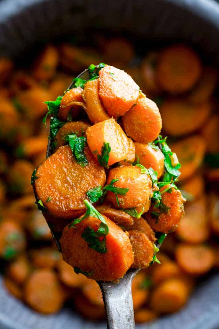 a close up of Hot Moroccan Carrots in a spoon