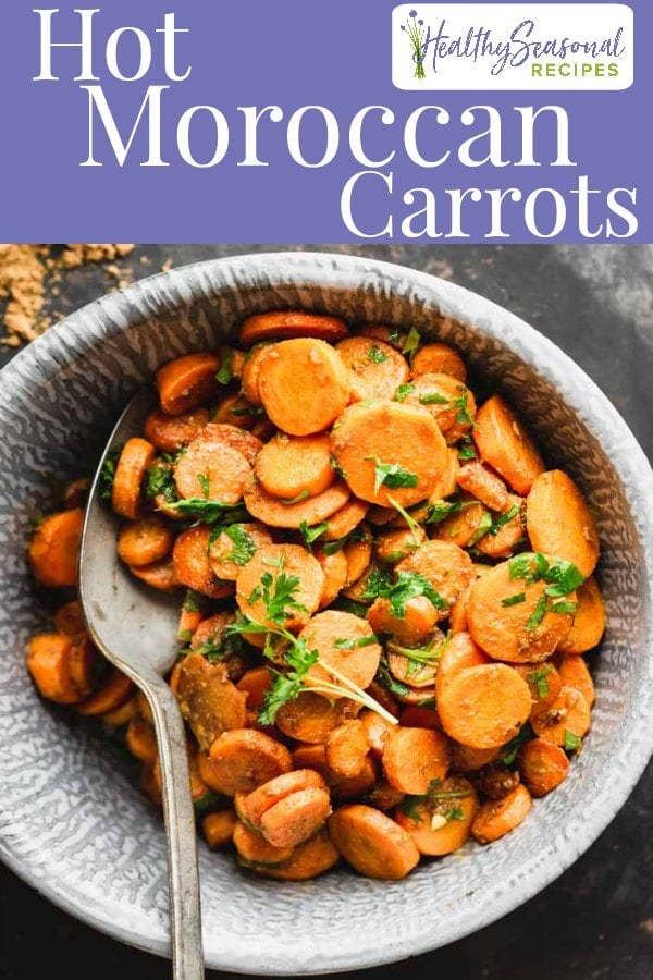 Hot moroccan carrots in a metal bowl overhead