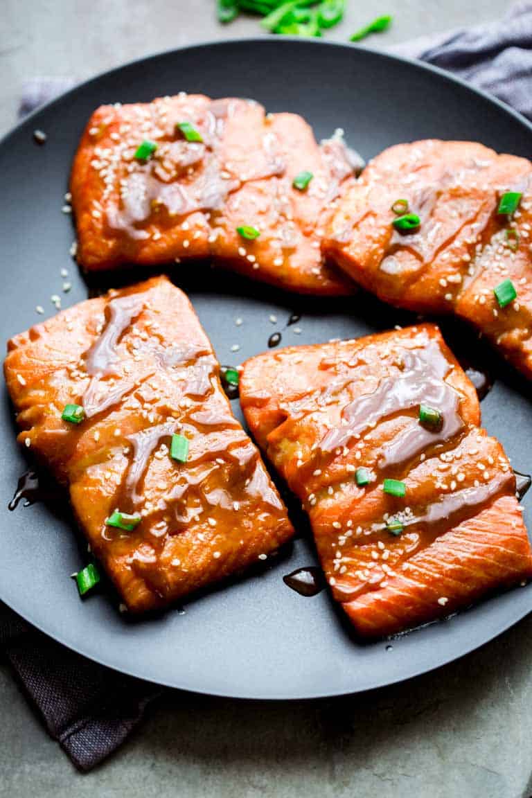 This maple tahini roasted salmon is a keep in your back pocket recipe! It’s glamorous enough for company, but easy enough for a kid friendly weeknight. And it only has 10 minutes of prep time!