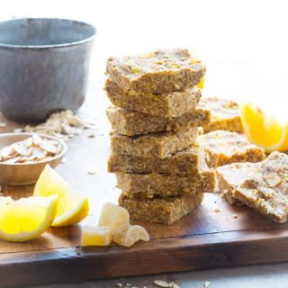Lemon, almonds, chia and crystallized ginger come together in these simple Lemon Ginger Chia No Bake Snack Bars. They are naturally sweetened with Medjool dates and honey and have a gluten free version. Healthy Seasonal Recipes | Katie Webster