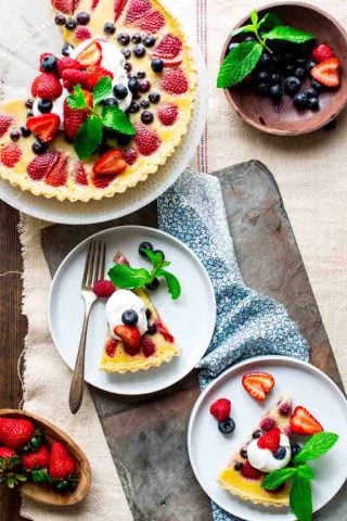 overhead tablescape with red white and blue buttermilk berry tart