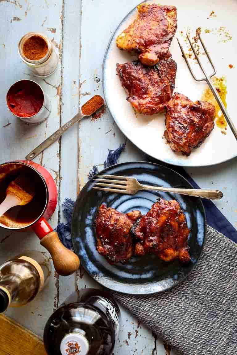 a table scape with the grilled chicken sauce and ingredients from overhead