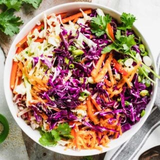 asian coleslaw in a bowl overhead closeup
