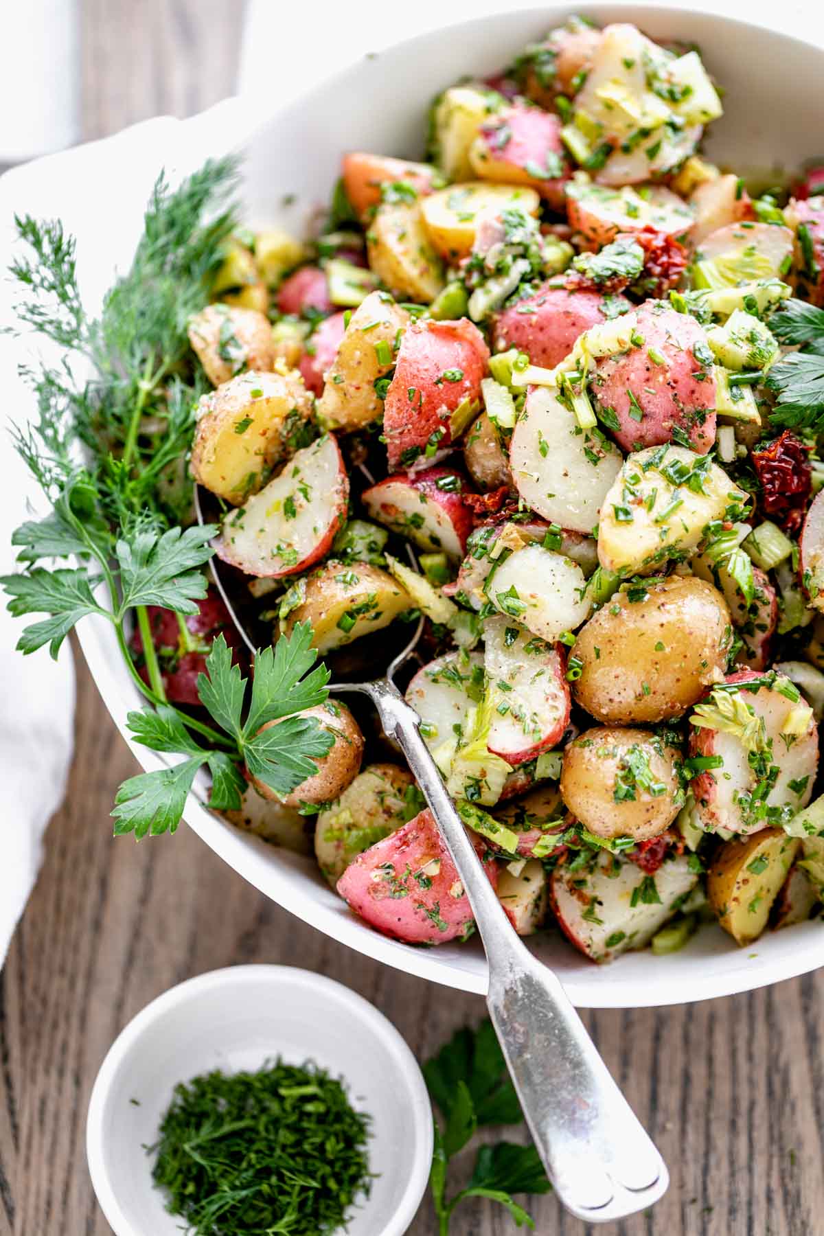 close up of potato salad with herbs