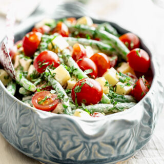 green bean salad with cherry tomatoes and cheese